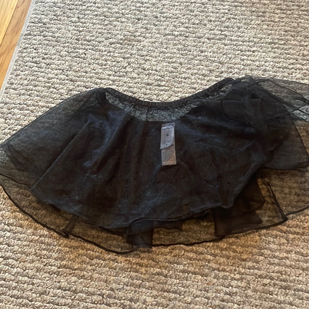 Carter’s sheer dance skirt.